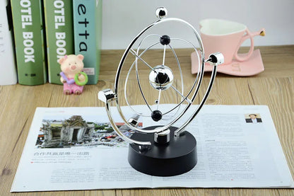Galaxy Magnetic Perpetual Motion Pendulum – Rotating Earth Desk Decor