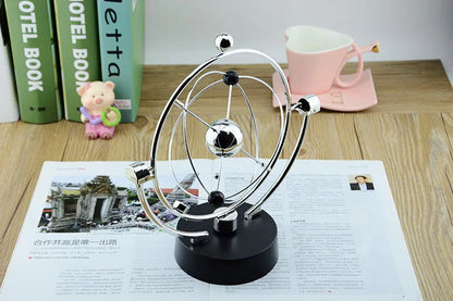 Galaxy Magnetic Perpetual Motion Pendulum – Rotating Earth Desk Decor